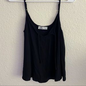 black tank with strings in the front